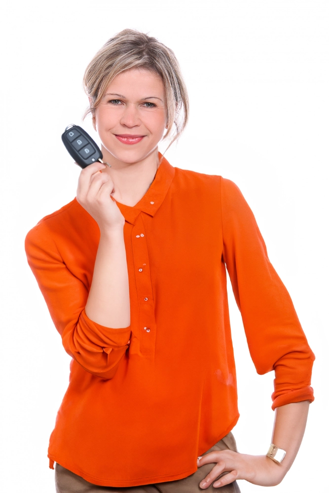 driving instructor holding car keys